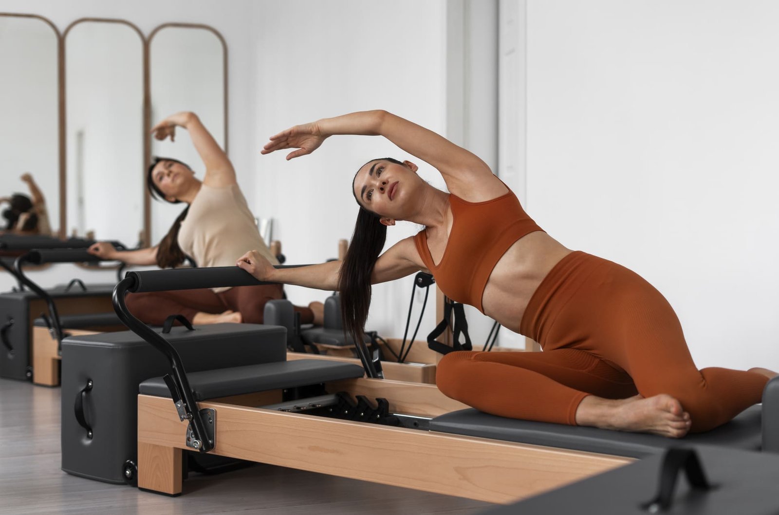 Aula de Pilates em aparelho reformer
